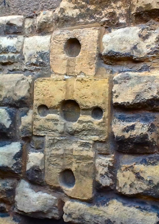 Picture of the "Templar's" stone Cross set in the wall